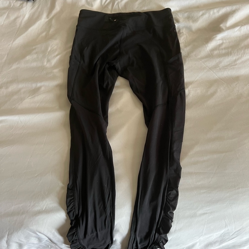 Lululemon workout pants. Black size 8 women’s with mesh detailing